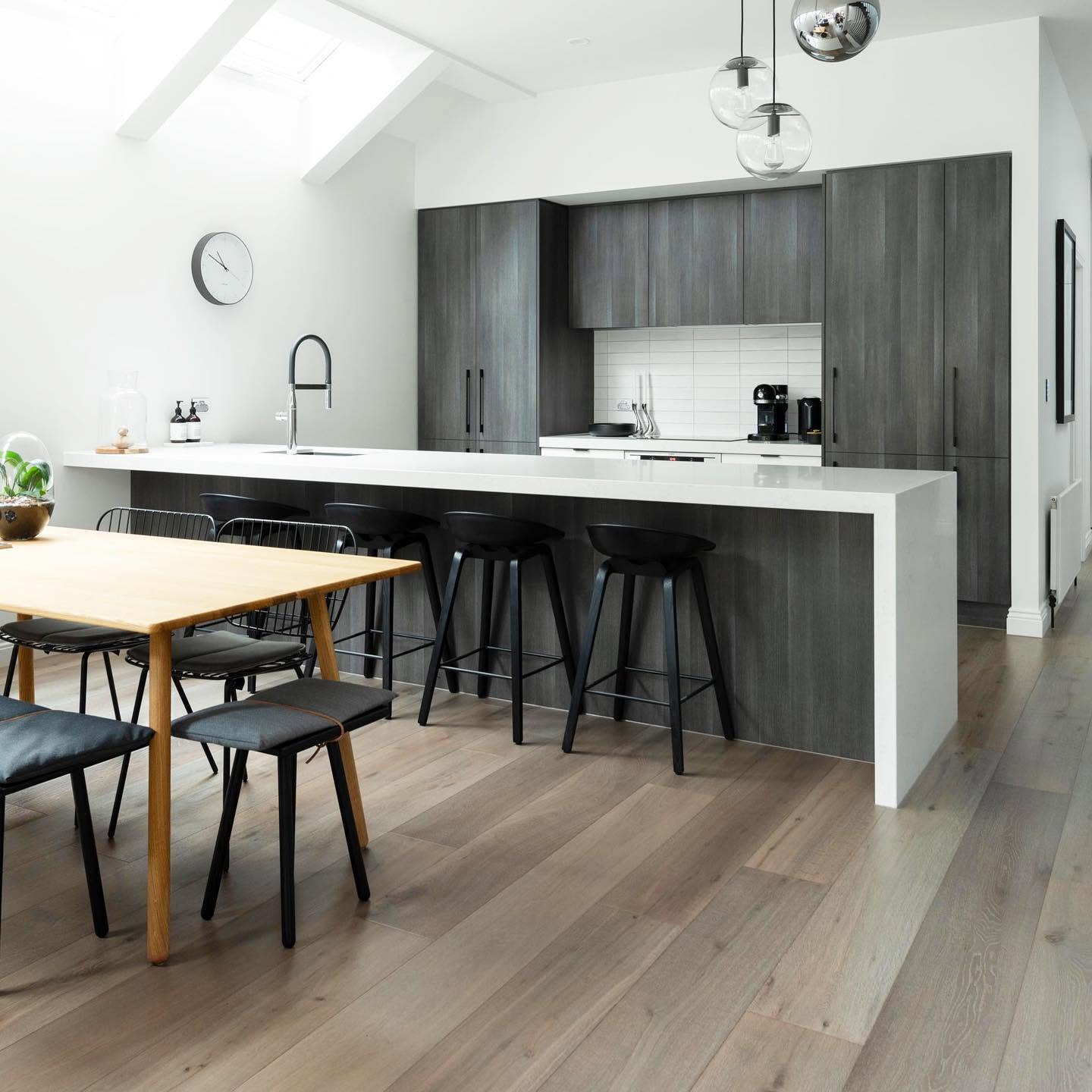 Wide board French oak flooring in a light-filled Melbourne living room