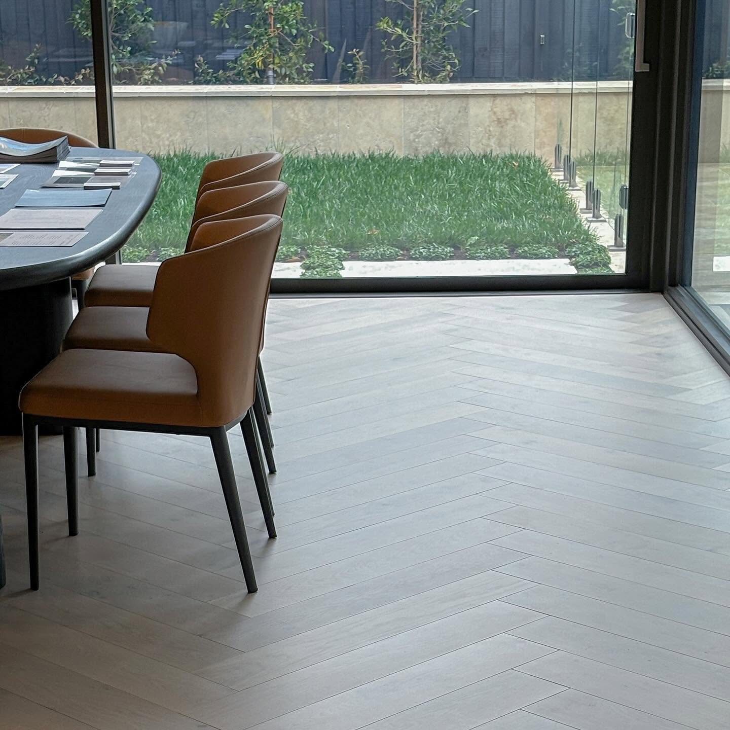 Pale herringbone oak in a dining room